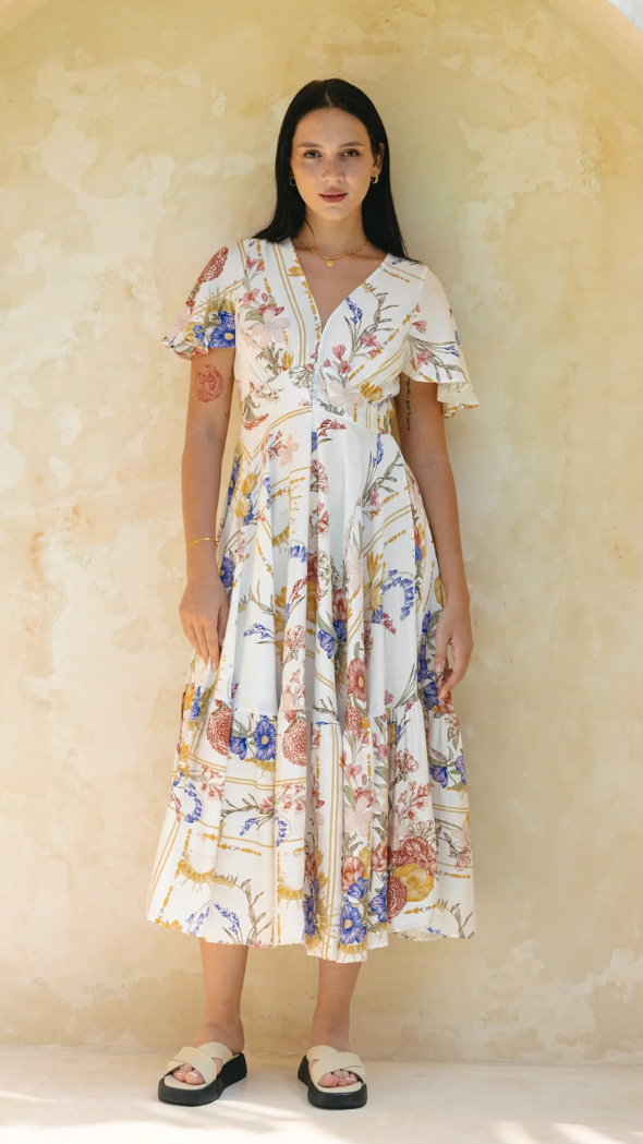 midi dress with butterfly sleeves and a-line fit with all over floral print