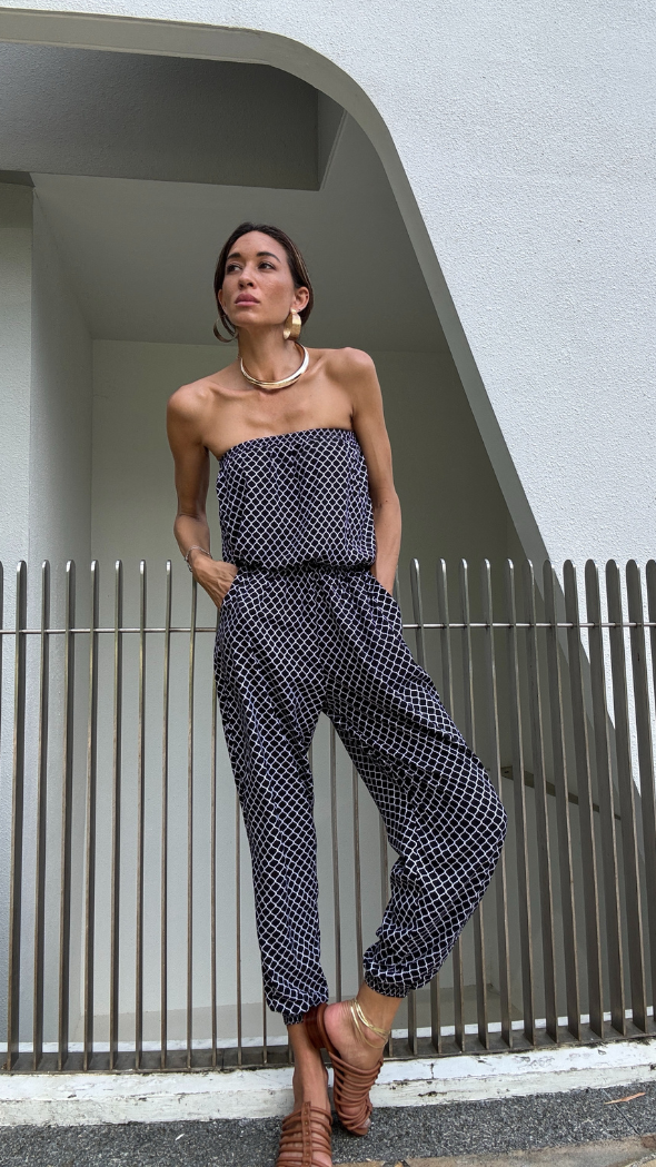 bandeau style jumpsuit with mosaic print, pockets and cuff ankles