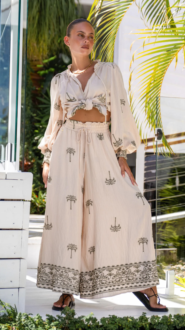 Palm green Verona culottes featuring vibrant leaf pattern and flowy silhouette